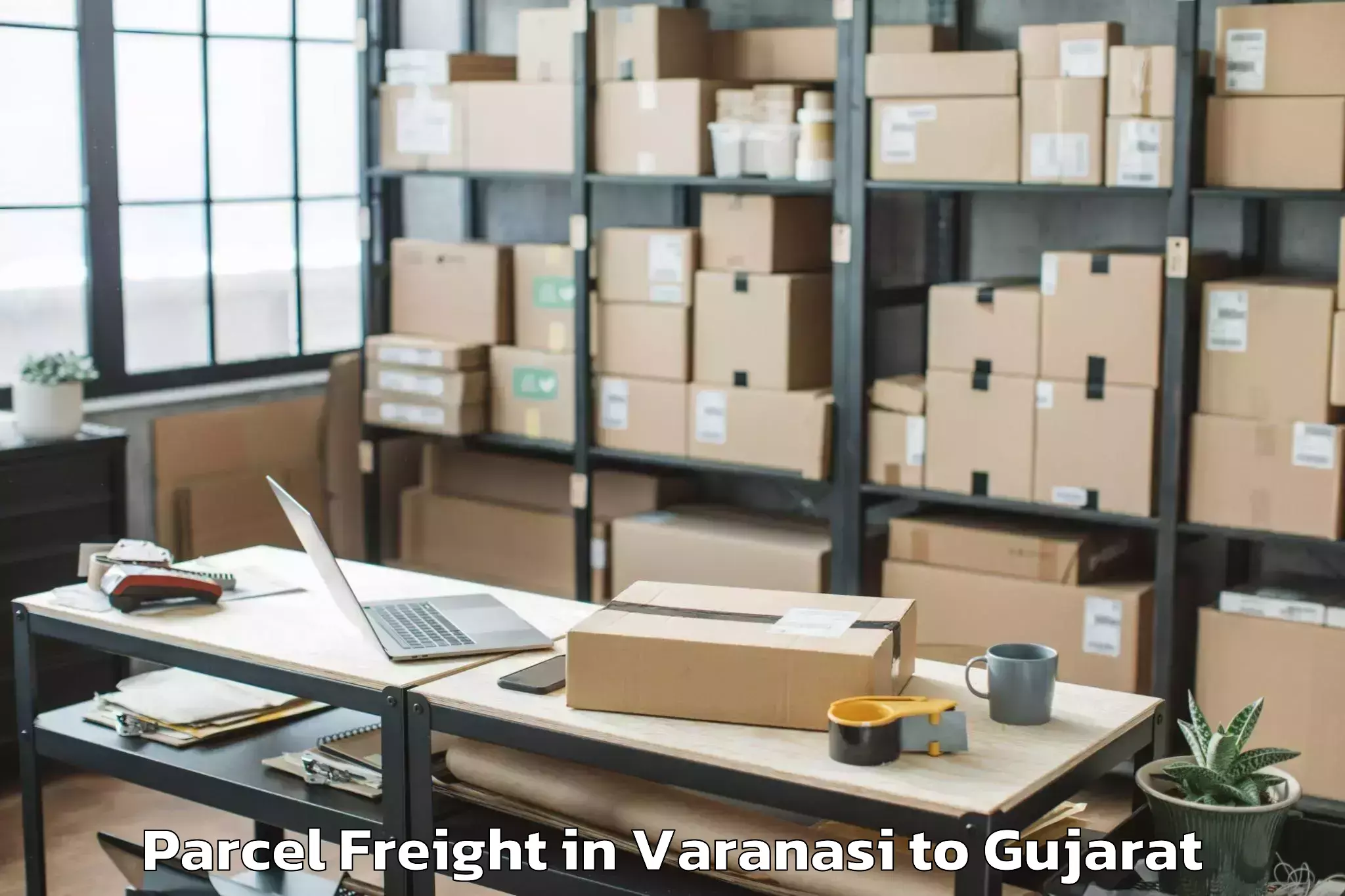 Book Varanasi to Kamrej Parcel Freight